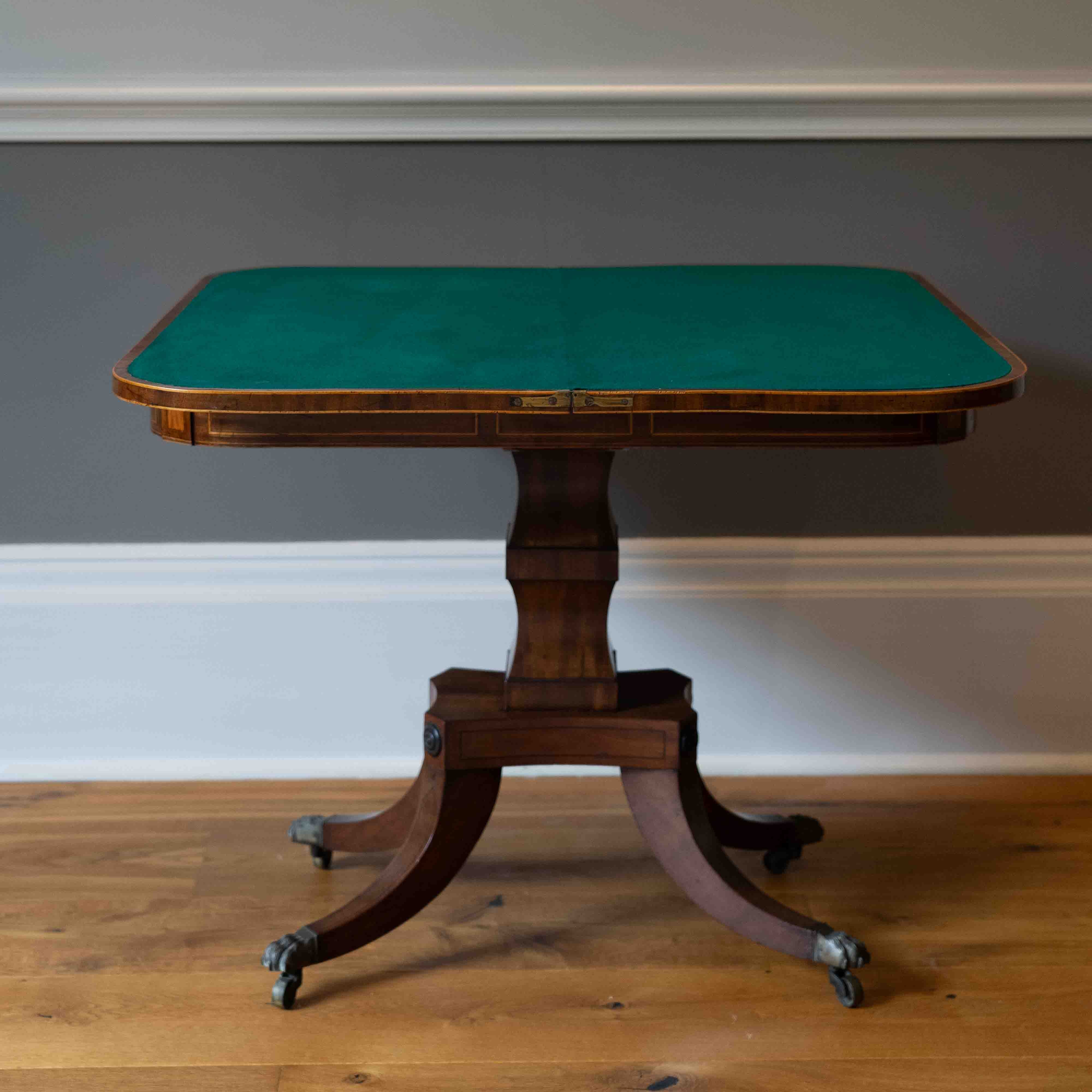 A George IV satinwood banded mahogany D shaped folding card table, width 90cm, depth 44cm, height 72cm. Condition - good